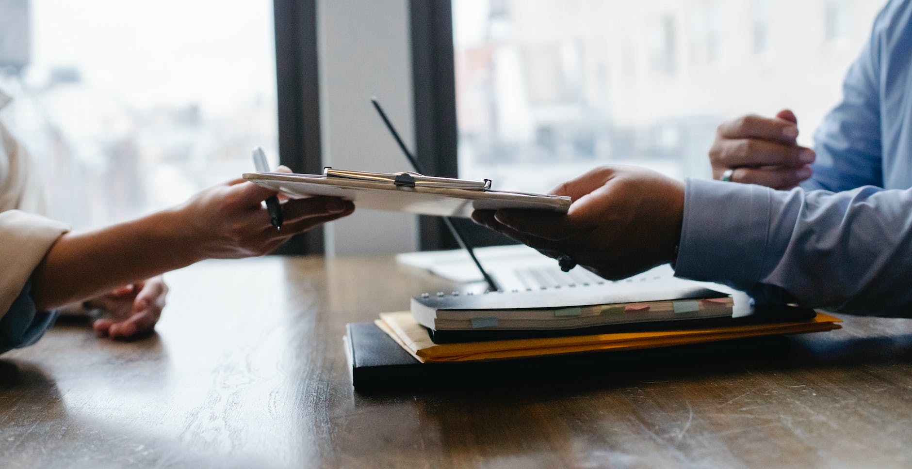 Virtual Assistant handing over a work report